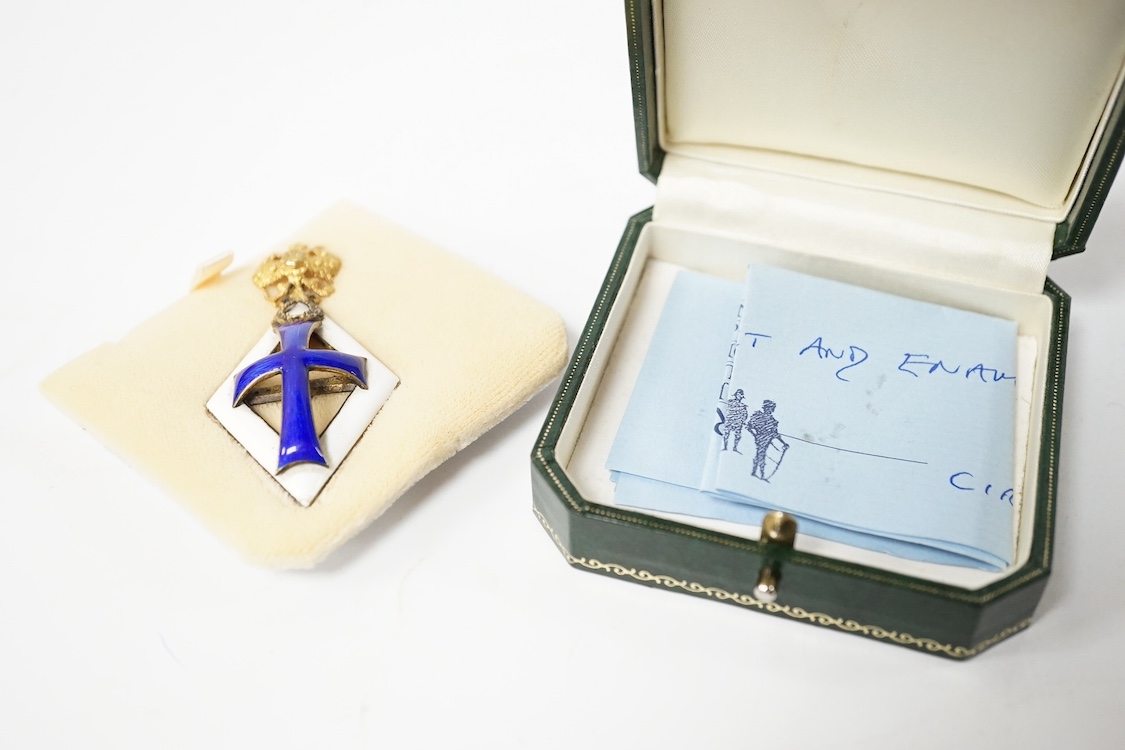 A Russian award issued between 1899-1908 to students who failed to graduate from medical school, known as the Patrikeev-Boynovich badge, enamel on silver with a gilt double eagle. Condition - fair to good, minor damage t